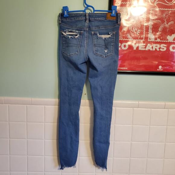 American Eagle Heavily Distressed Stretch Skinny Jeans Distressed Medium Wash - Picture 6 of 12